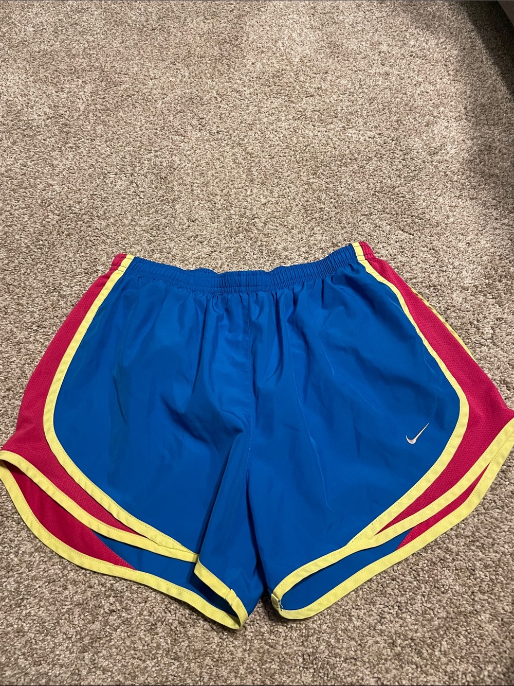 Nike Women’s Blue Athletic Shorts with Pink Panels and Yellow Trim